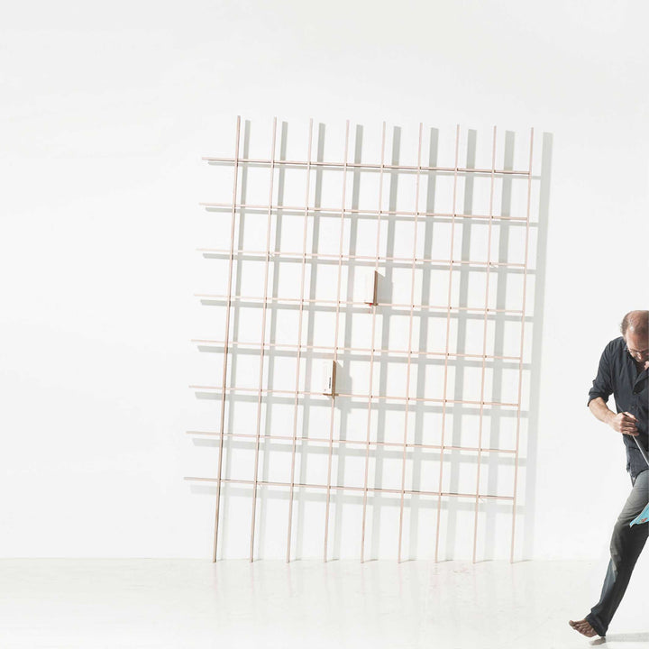 SCHLAGSEITE - bookshelf with inclination | BREUER & BONO