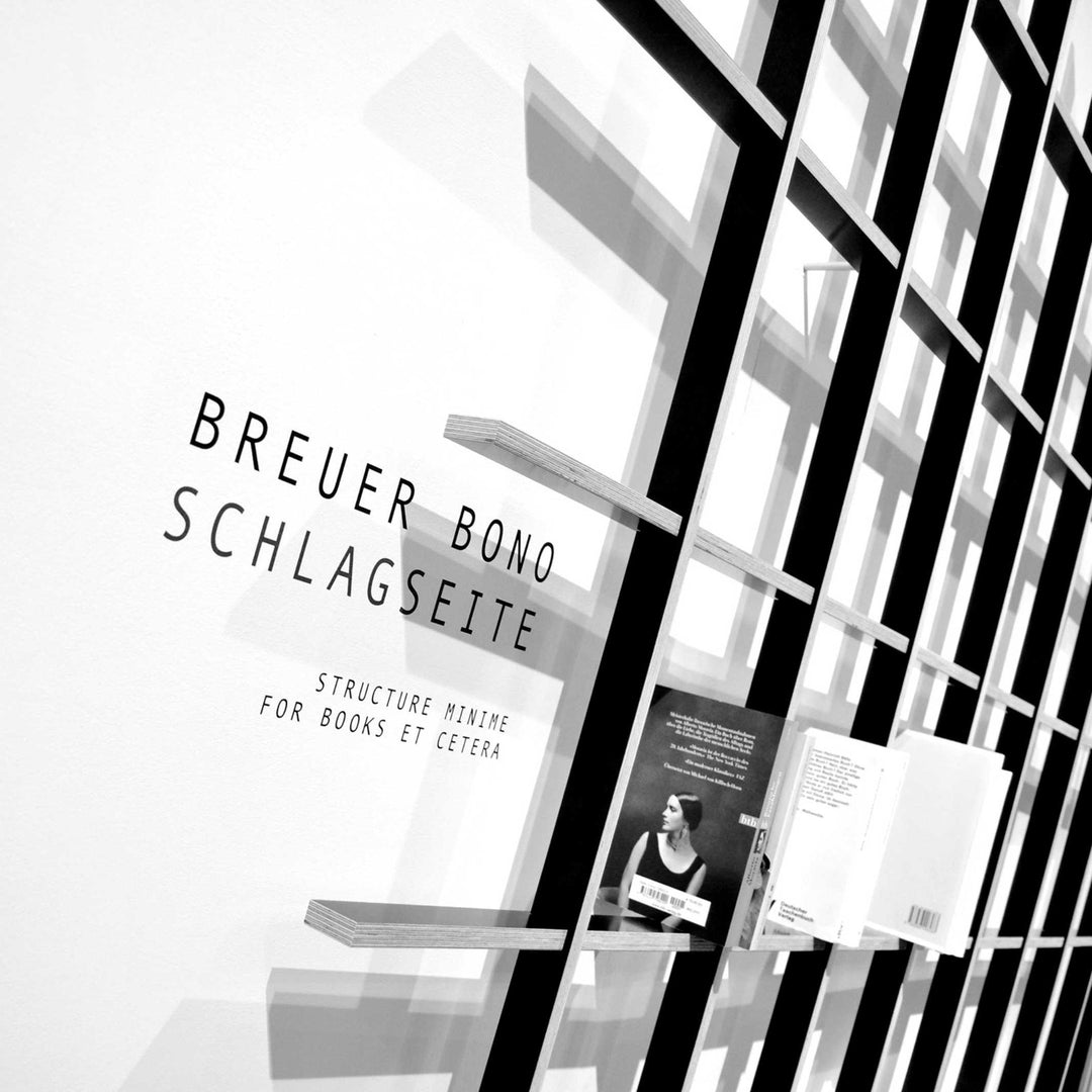 SCHLAGSEITE - bookshelf with inclination | BREUER & BONO